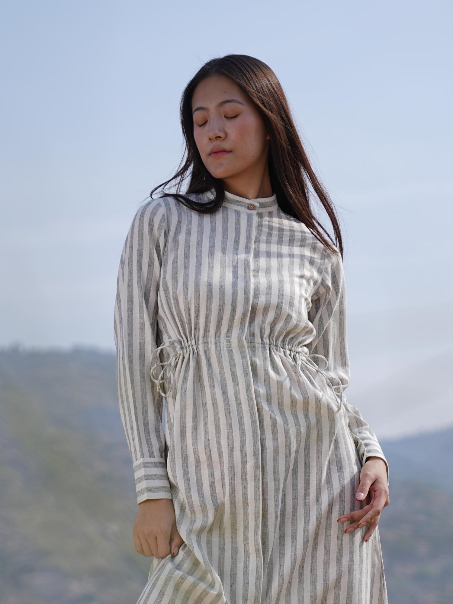 Relaxed, anti-fit striped cotton maxi dress shown in natural daylight
