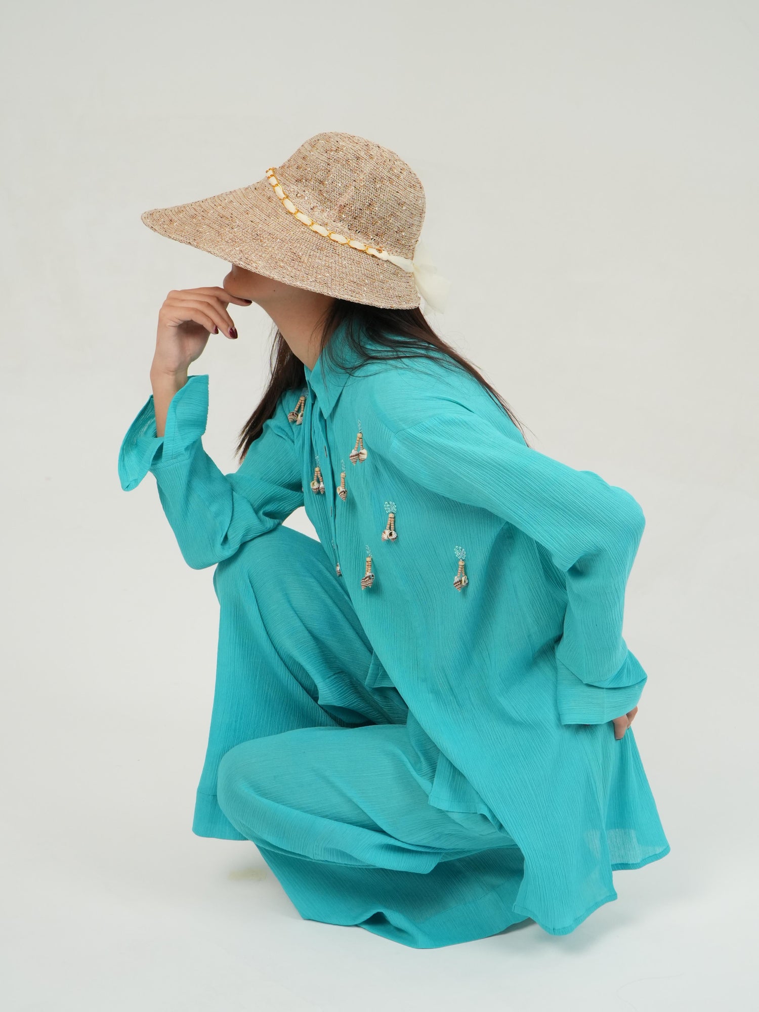 Loose, flowing crinkled cotton pants of the turquoise co-ord