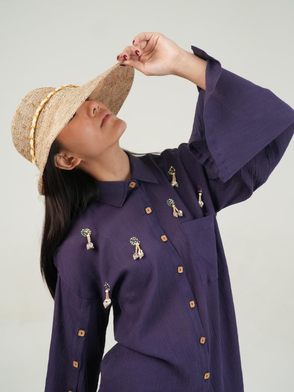 Woman wearing the Vanshitaaz Mulberry Purple crinkled cotton co-ord — a button-down top with wide-leg slit trousers