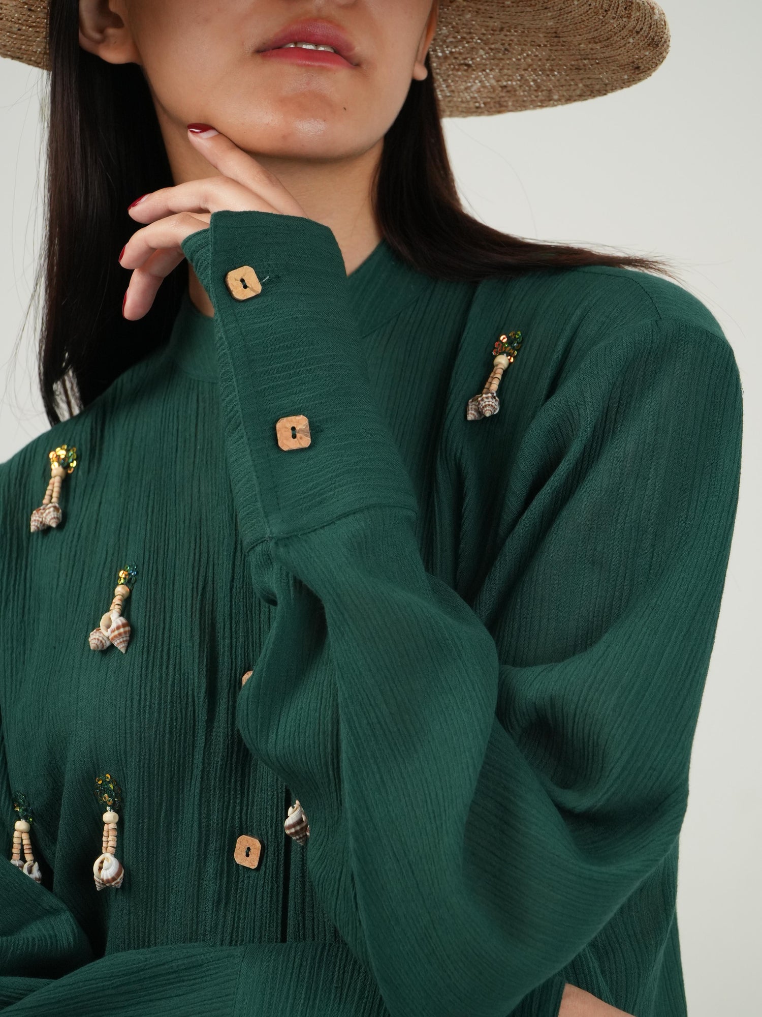 Adjustable tie detail at the hem of the crinkled cotton co-ord