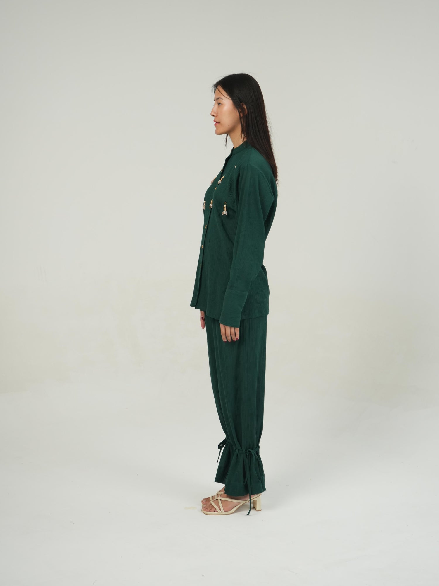 Detail of the hem and tie finish on the Racing Green crinkled cotton co-ord set