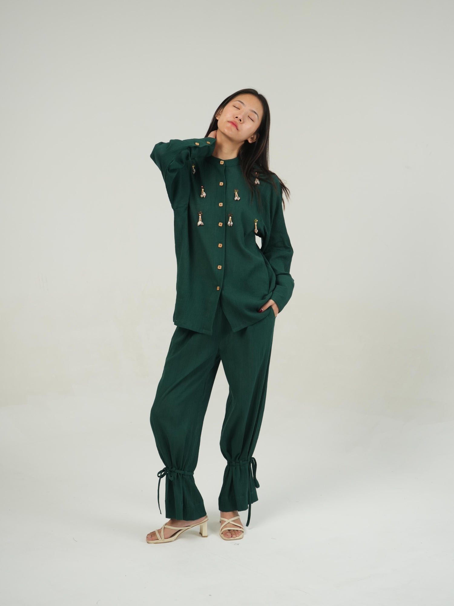 Model styling the Racing Green crinkled cotton co-ord set for a resort or beach day
