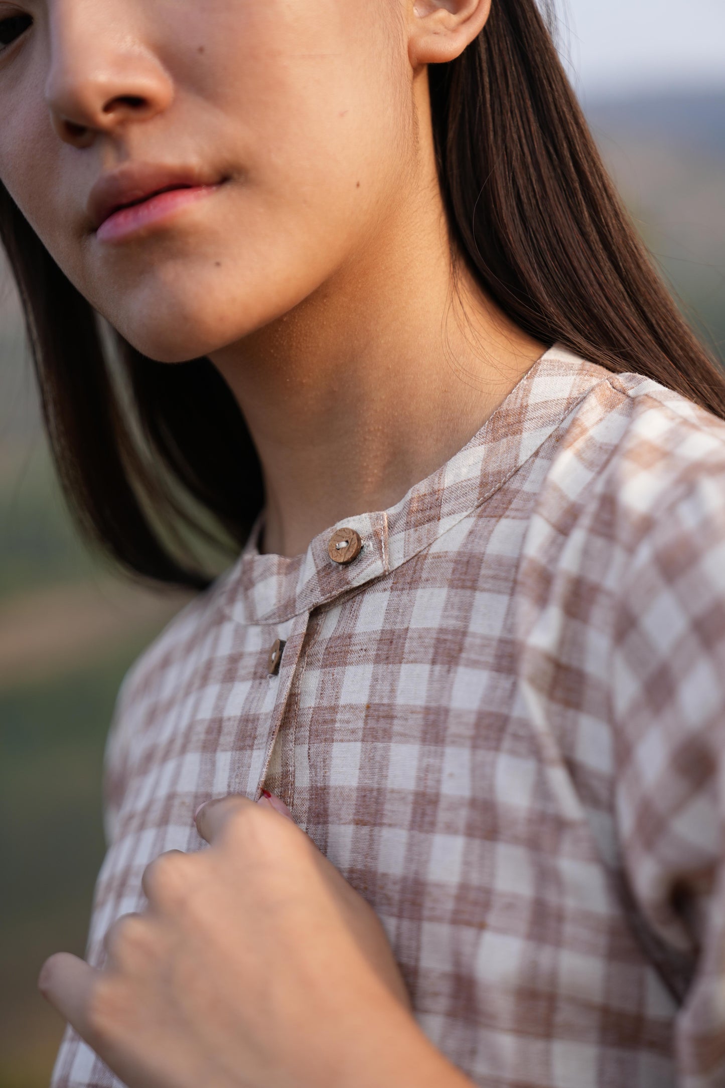 Model styling the checked cotton co-ord set for a warm summer day