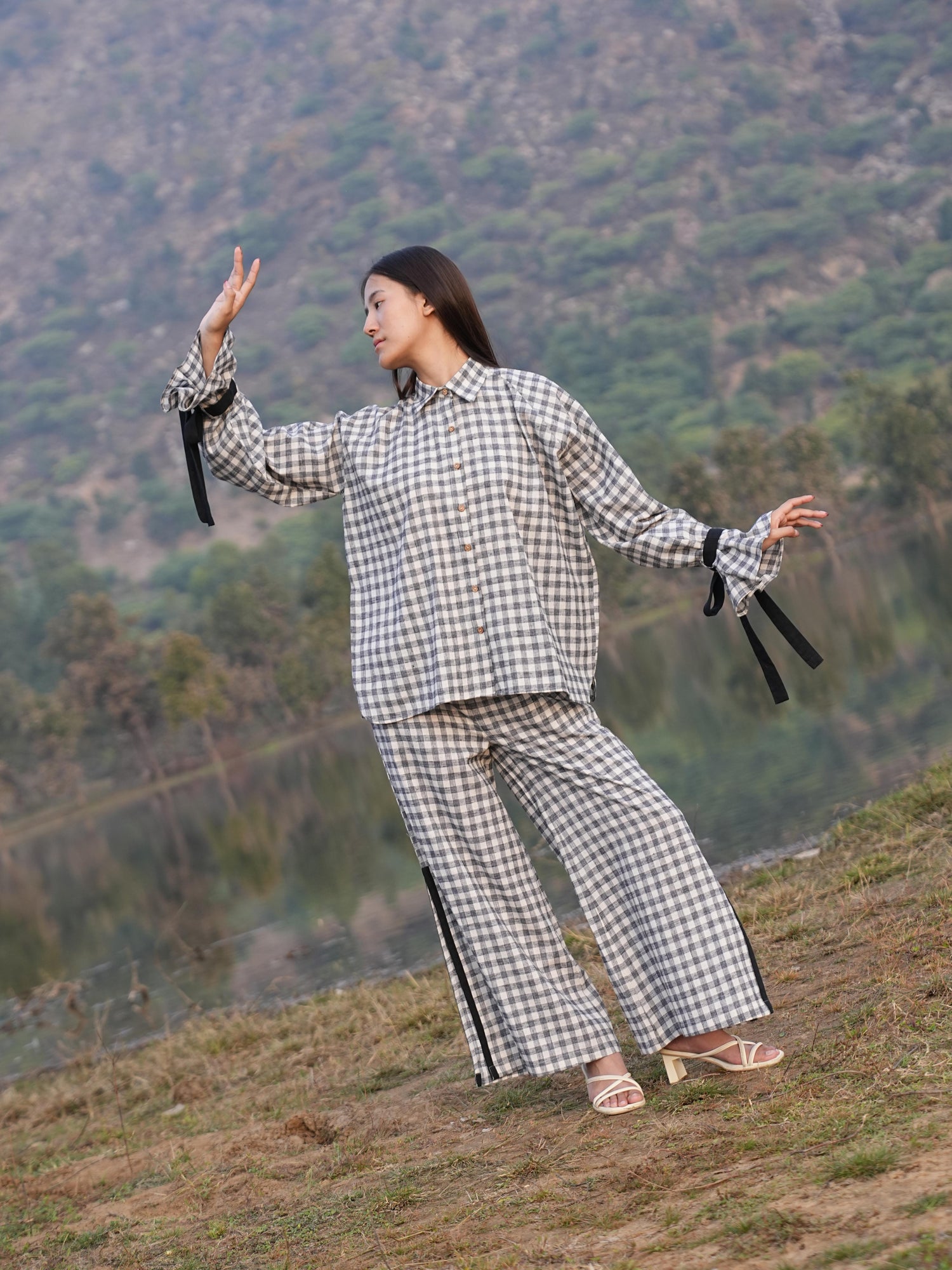 Model styling the checked cotton co-ord set for a warm summer day