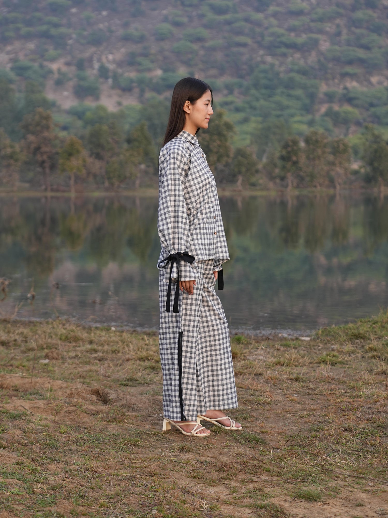 Side profile of the checked cotton co-ord set, showing its relaxed drape
