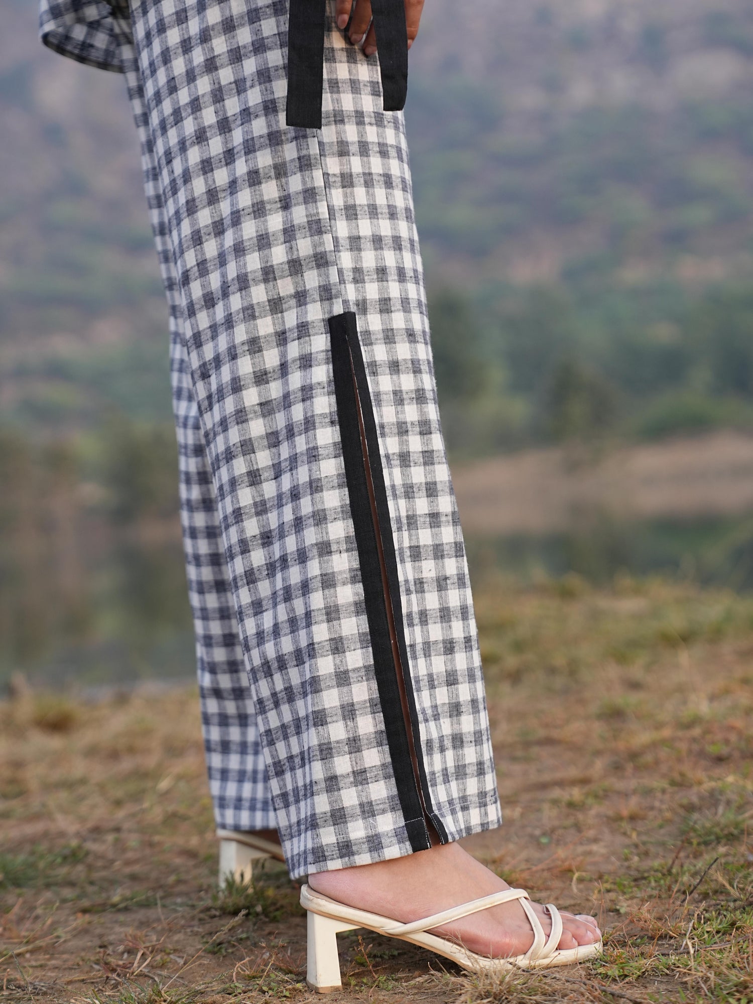 Detail of the clean French-seam finish on the checked cotton co-ord set