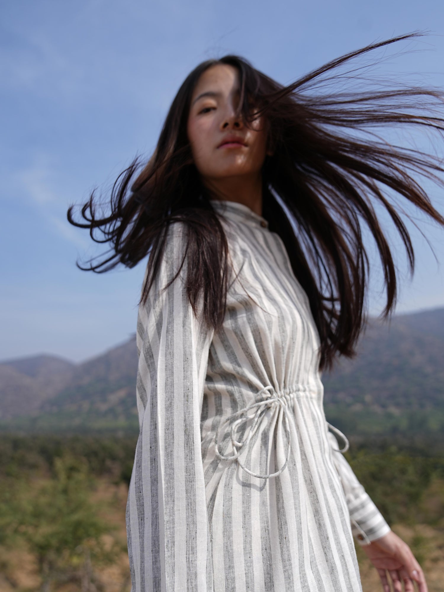 Full-length view of the striped cotton maxi dress