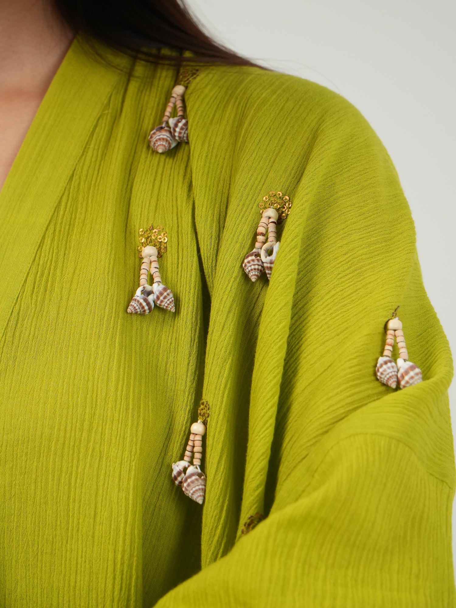 Matching wide-leg crinkled cotton pants in lime green