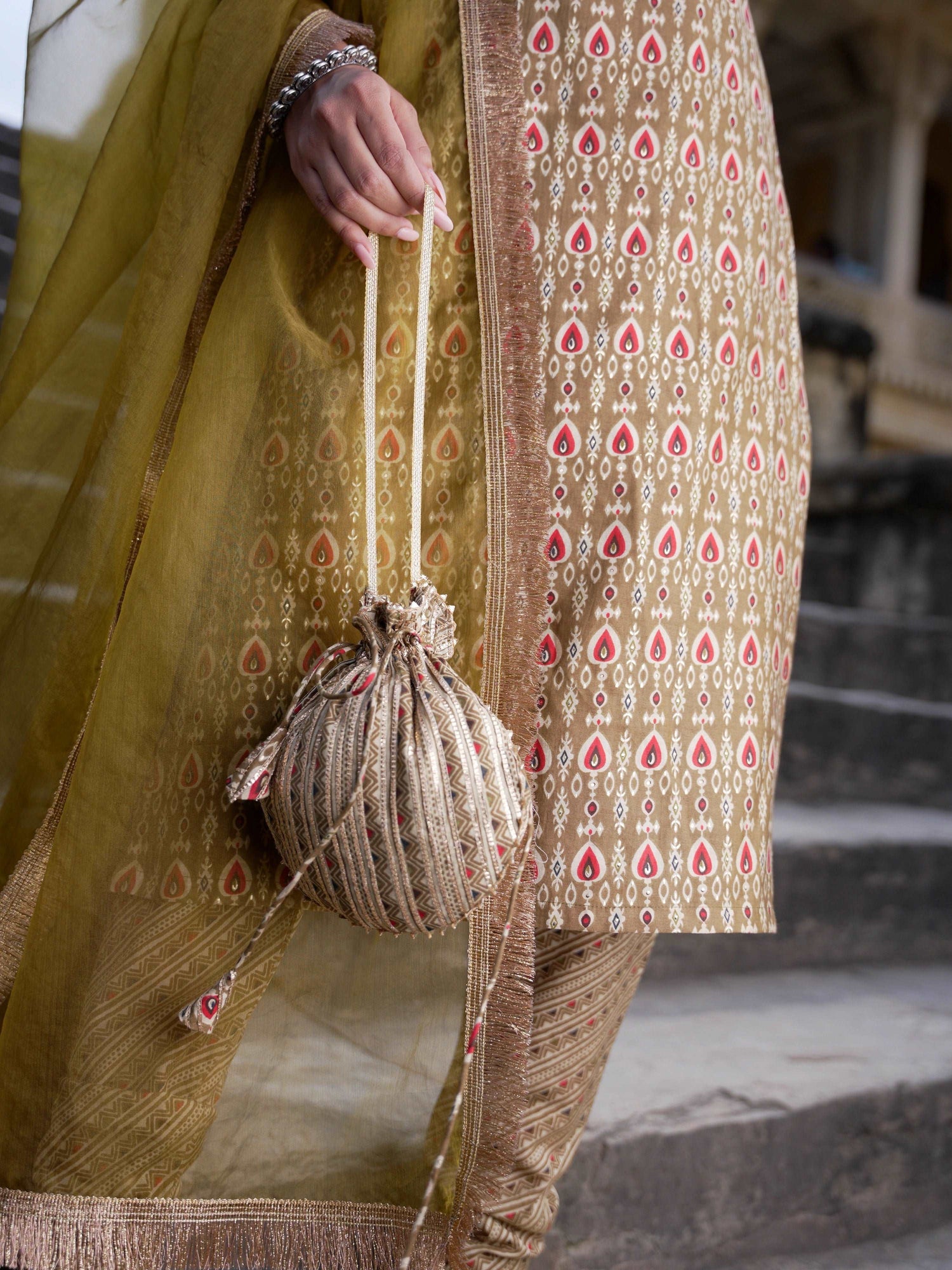 Kurta Churidar & dupatta with potli bag